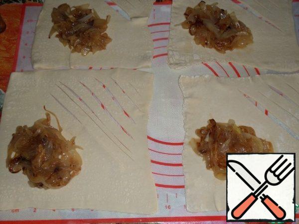 Put fried onions on each layer of dough (about 1 tbsp.).