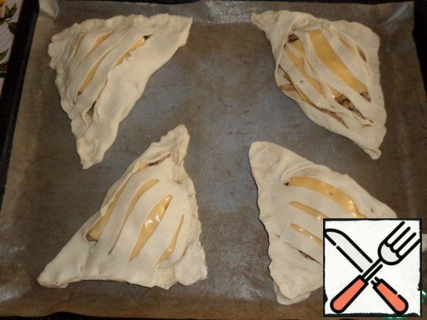 Place the pies on a baking sheet lined with parchment or a baking mat.