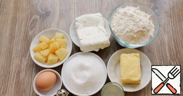 Prepare all the ingredients you need to make the curd and pineapple shortbread cake.