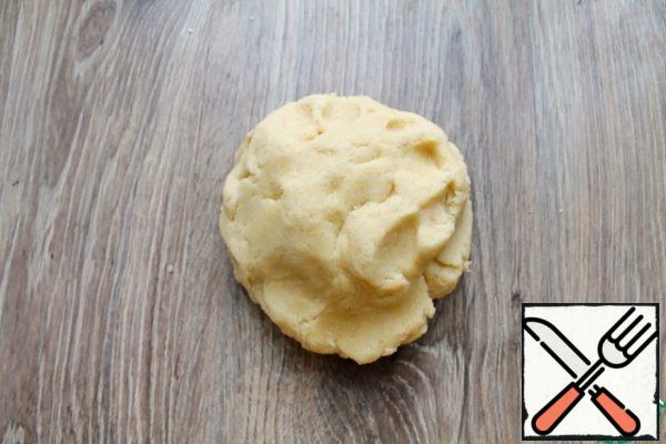 Knead quickly to a soft, smooth dough.