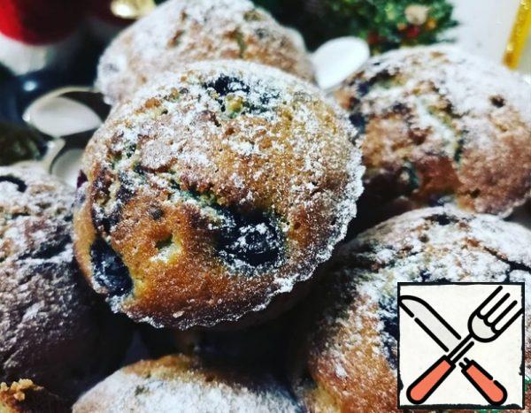 When the muffins are cool, sprinkle them with powdered sugar and serve.