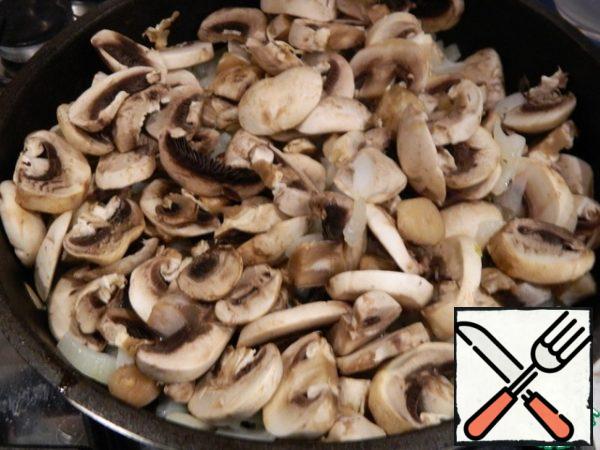 Add mushrooms and fry until tender.