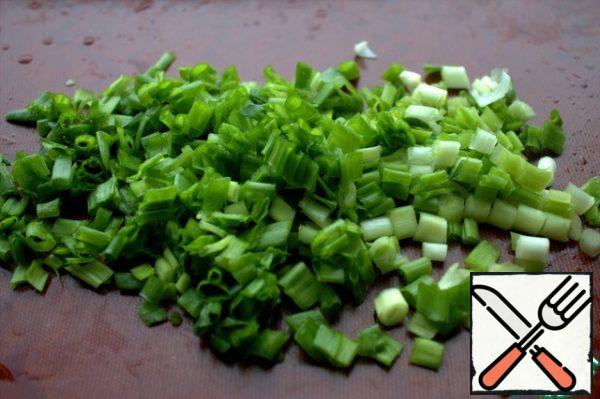 Chop green onions.