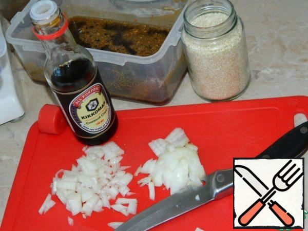 Mix soy sauce, sugar, chopped onion, garlic, ginger, sesame seeds and vegetable oil.