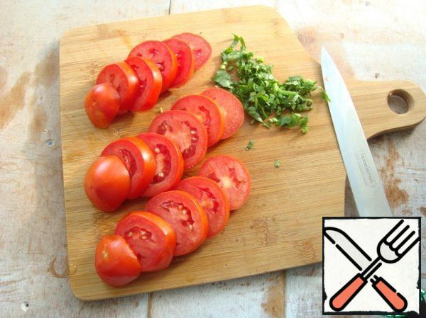 Cut the tomatoes in round pieces lengthwise.
Chop the greens. I chopped parsley, I just didn't have any dill. Dill is perfect with parsley.