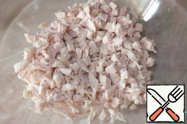 Cut the boiled chicken breast into small cubes