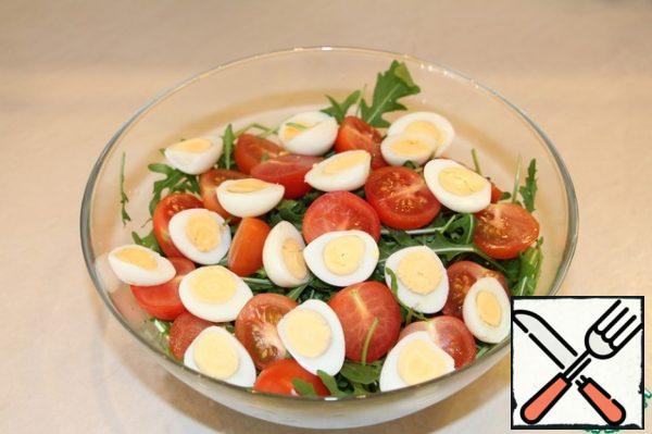 Add the eggs, cut in half...