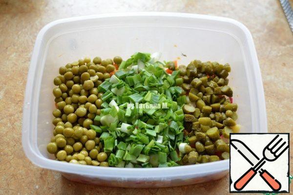 Add the peas, chopped onion, and chopped gherkins;
Stir well;