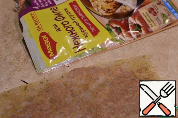 Put the fillets in the sheets for frying, press tightly with your hands, fry.