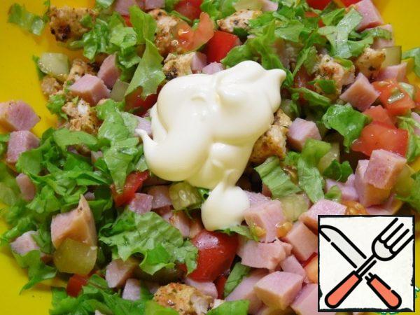 Mix all the prepared products, add salt, and season with mayonnaise.