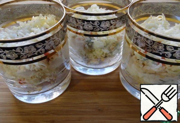You do not need to cover the top layer of cheese with dressing.
