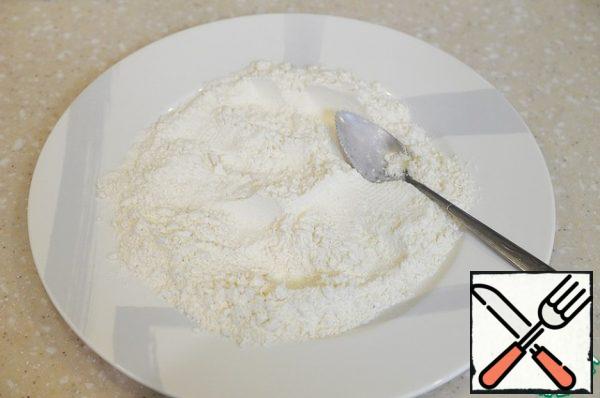 In a bowl, mix the flour with the remaining salt.