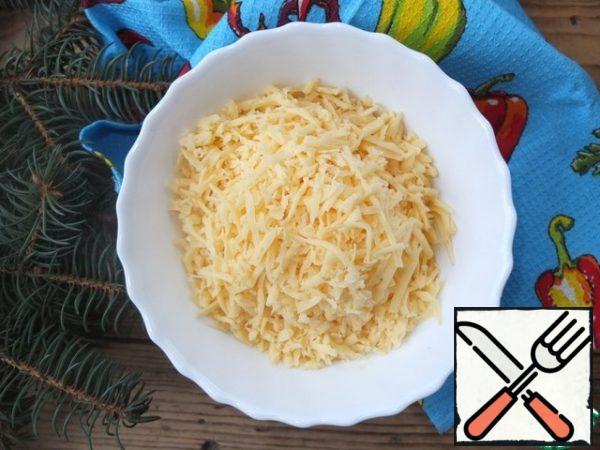 Rub the cheese on a coarse grater.