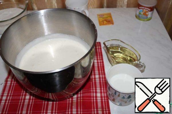 Add milk and vegetable oil. Beat again.