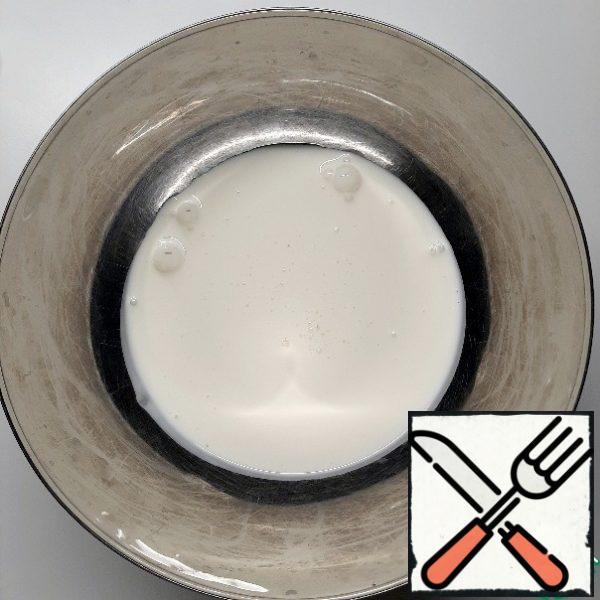 Pour the cream into a suitable bowl for a water bath.