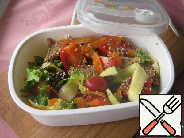 We transfer the finished salad to a container and take it with us on a picnic.