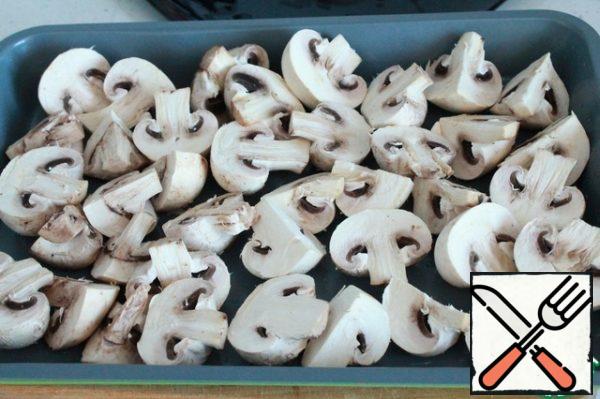 Cut the mushrooms in half, large into 4 parts. Spread on a lightly greased baking sheet and send it to a preheated 150*I c oven for 25-30 minutes.
Mushrooms do not need to be fried; when they are baked, it is much healthier, and the smell is simply amazing.