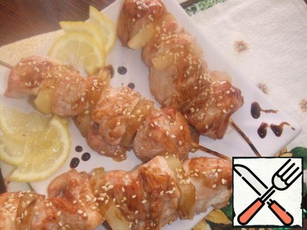 Ready-made shish kebabs hot sprinkle with sesame seeds.