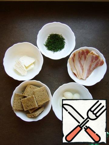 To begin with, cut the bread into small pieces, boil the eggs, cut the dill finely.