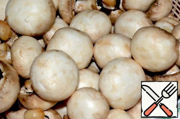 Mushrooms are washed or thoroughly wiped with a cloth.