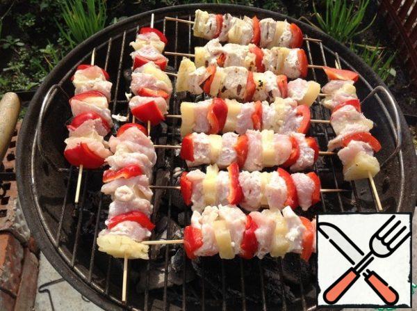 Bake on a barbecue grill until tender, 5 minutes on each side.