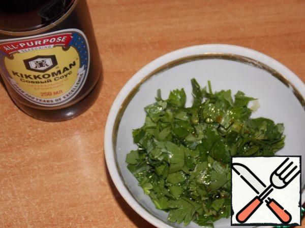 Add the parsley and soy sauce to the garlic and mix.