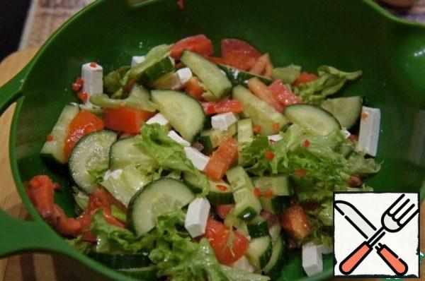 Pour over the salad and mix very gently.