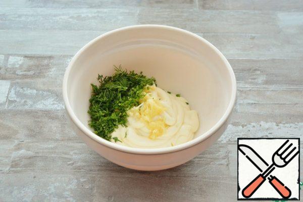 For the layer, combine mayonnaise with crushed garlic and dill