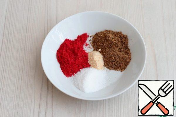 Prepare the spices for marinating the meat. In a bowl, add salt (to taste), add sweet paprika, add the prepared mixture for frying meat, which includes: coriander, onion, nutmeg, paprika, black pepper, cumin, marjoram, garlic, red pepper, basil, savory.