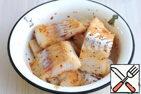 Cover the cod fillets evenly with the spicy mixture. Set aside the bowl of cod fillets.