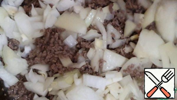 Add the onion, mix, and continue to cook for another 20-25 minutes (until tender)