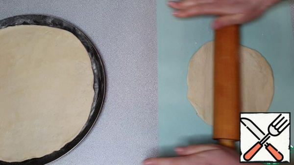 Cover the top with the second part of the dough