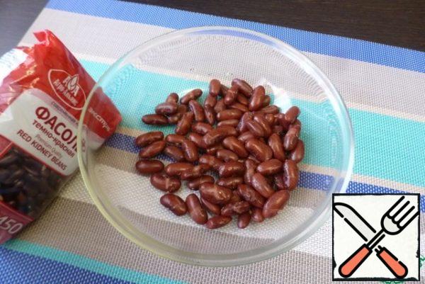Cook the beans, following the instructions on the package.