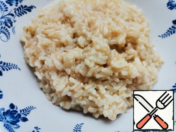 We boil the rice as indicated on the package. I added a little more water to achieve a slightly viscous consistency.