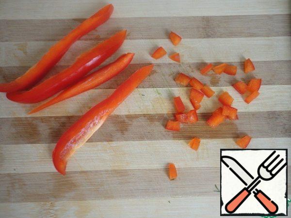 Five thin slices of red pepper finely chopped.