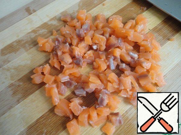 Finely chop the salmon.