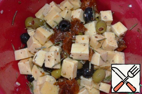 Add the cheese and olives to the marinade, mix well and let it stand in the refrigerator, under a closed lid all night! Of course, it's good to mix it sometimes, but you don't need to wake up on purpose!)))