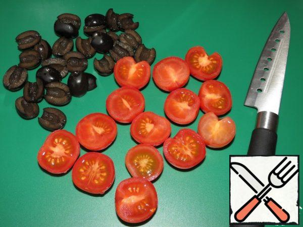 Cut the olives into slices, and the cherries in half.