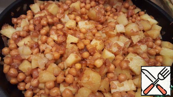 Add the potatoes to the pan. Mix well. Cover and simmer for another 5-10 minutes.
