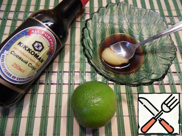 For the dressing, mix soy sauce, lime juice and honey.