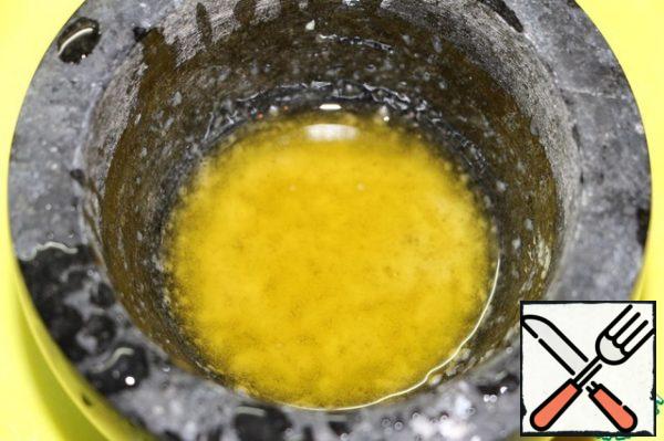 Pour in the olive oil and rub for a couple of minutes.