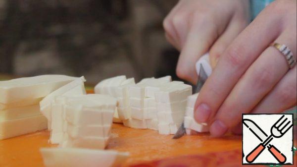Add the feta cheese cut into small cubes.