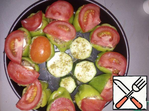 Cut the tomato into slices and spread on top. Bake at 180-200 degrees for about 30 minutes.