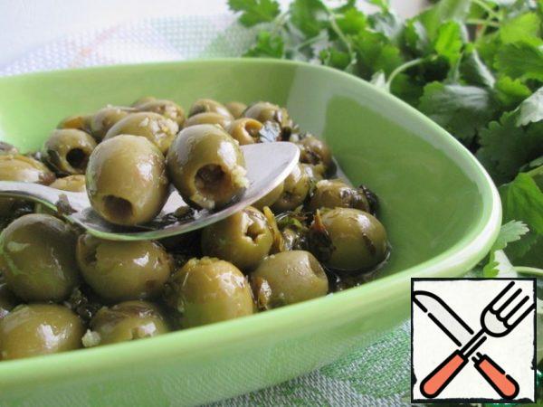 Before serving, heat the olives a little, so that their taste becomes more saturated!