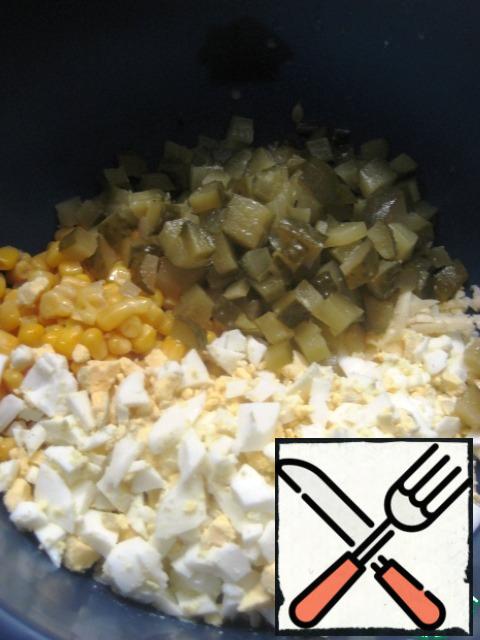 Add the chopped, hard-boiled eggs.