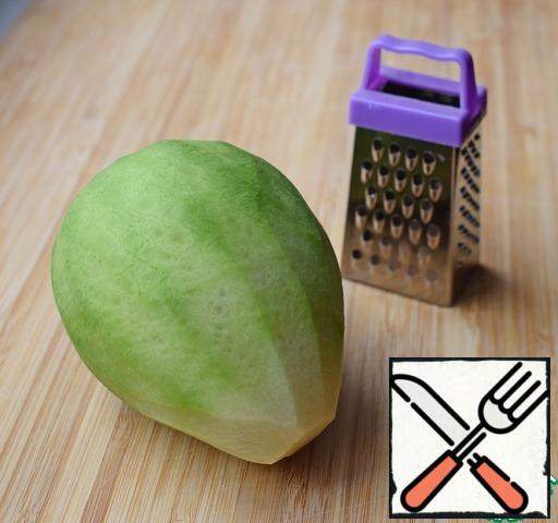 Peel the radish and grate it on a coarse grater. It is NOT necessary to scald the radish, soak it, etc. Its sharpness is softened by potatoes and eggs.
