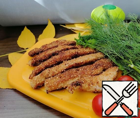 Roll each stick in breadcrumbs and fry in oil for a few minutes on each side over medium heat.