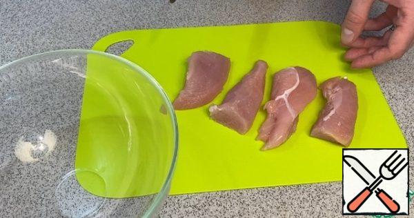 Cut the chicken breast into portions.
