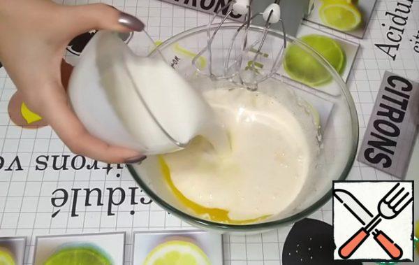 Add the melted butter and kefir. Mix it up.