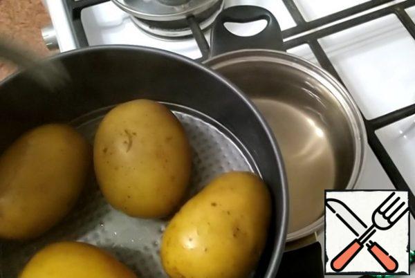 Then transfer the potatoes to a greased baking dish.